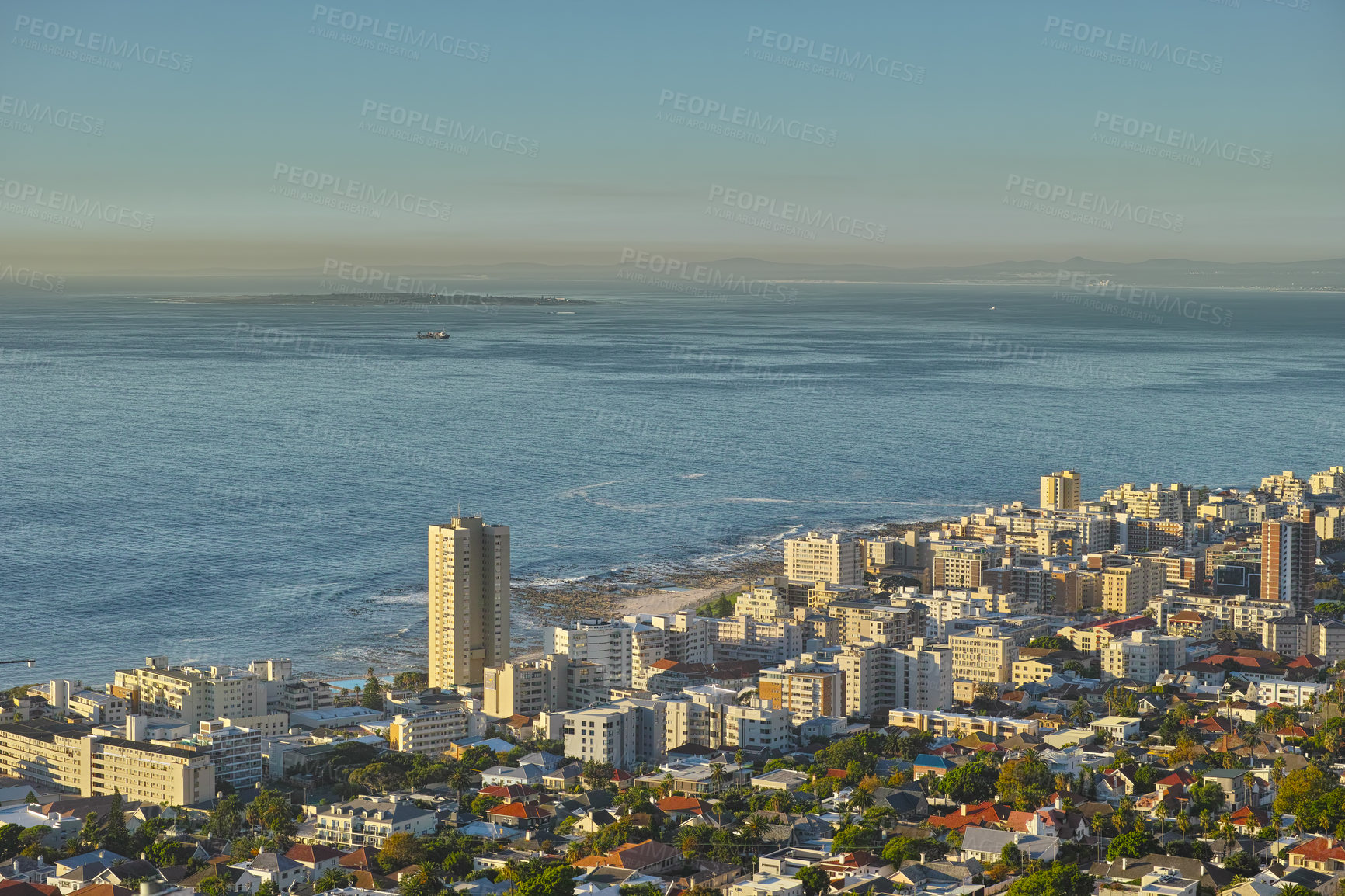 Buy stock photo Ocean, travel and city on hill with sky, buildings and natural horizon at coastal town location. Nature, cityscape and urban development on island with water, skyline or holiday destination in Spain