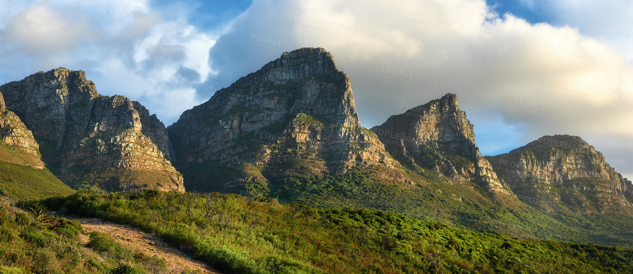 Buy stock photo Landscape view of mountains in Hout Bay in Cape Town, South Africa during summer holiday and vacation. Scenic hills, scenery of fresh green flora growing in remote area. Exploring nature and the wild