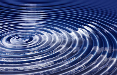 Buy stock photo Closeup of a ripple and pattern after a water drop splashed into a puddle with the reflection of a cloudy blue sky. Detail of rippled effect and vibration wave. Body of water or blue metallic liquid