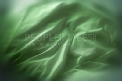 Buy stock photo Green satin fabric textures. Velvet smooth material with elegant folds. Closeup texture of natural green luxury cloth. Abstract background of green silk patterns or creases