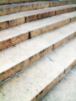 Buy stock photo A closeup of a staircase. Details of an empty stairway outside in an urban city or town. Wide solid stairs found in commercial or big residential buildings. Light textures on stony or concrete steps