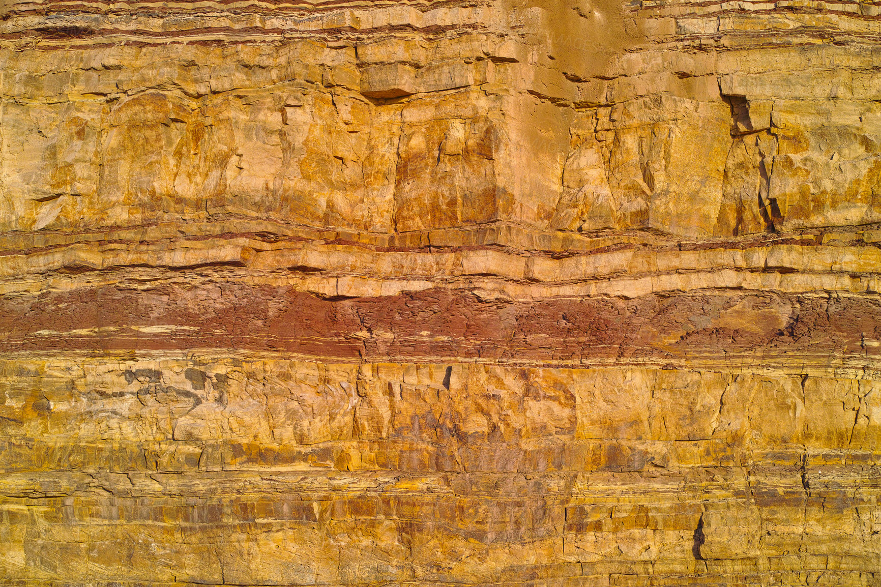 Buy stock photo Closeup of layered stone and detail. Remote and textured background layers of earth, sedimentary minerals, stones with copyspace. Mining underground geological strata rock or sand for geology studies