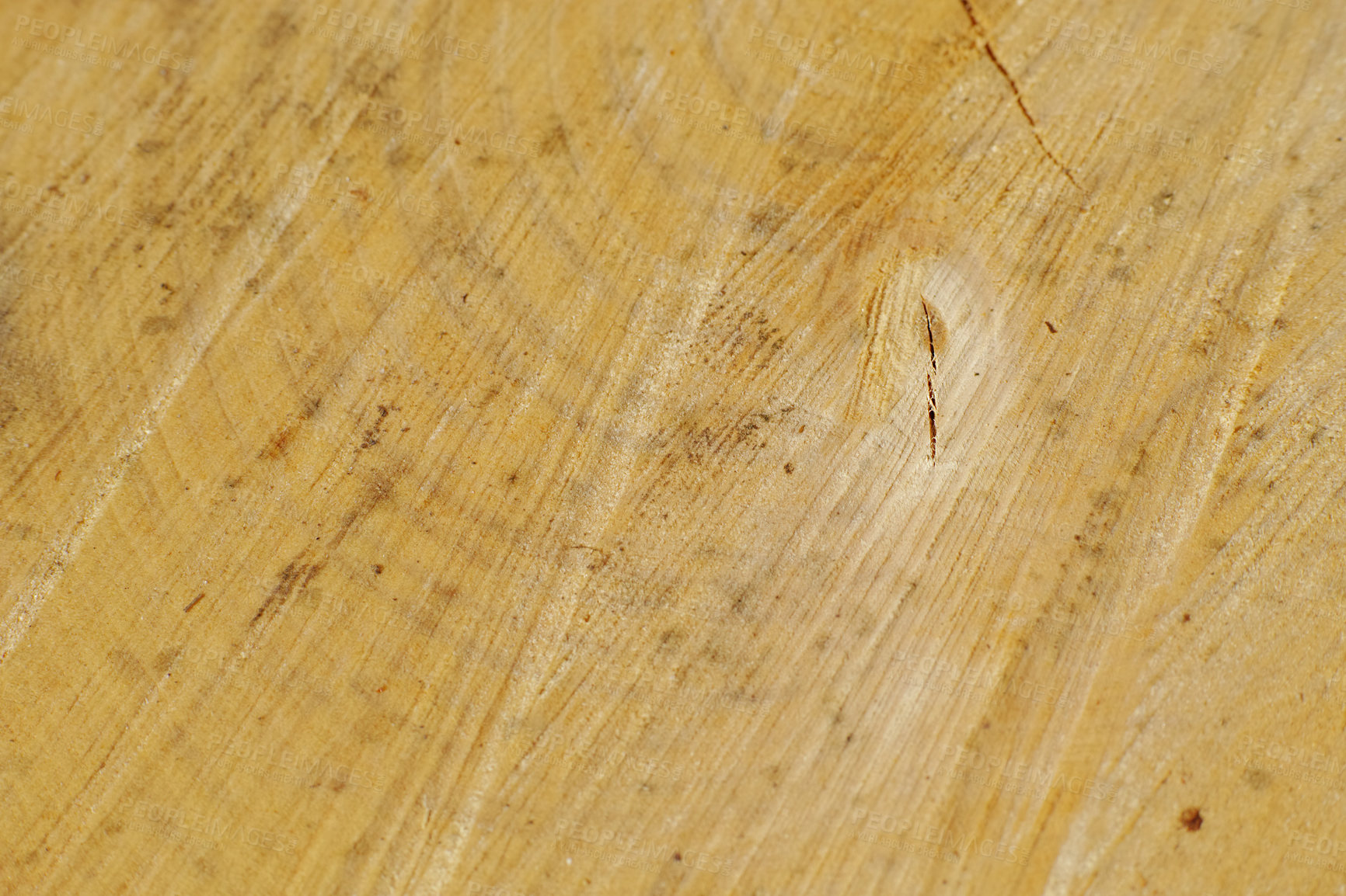 Buy stock photo Closeup of scratches on old wood. Detail of rough textures on a used chopping board. Wooden material with carving marks. Grunge patterns on an antique desk or cooking table.