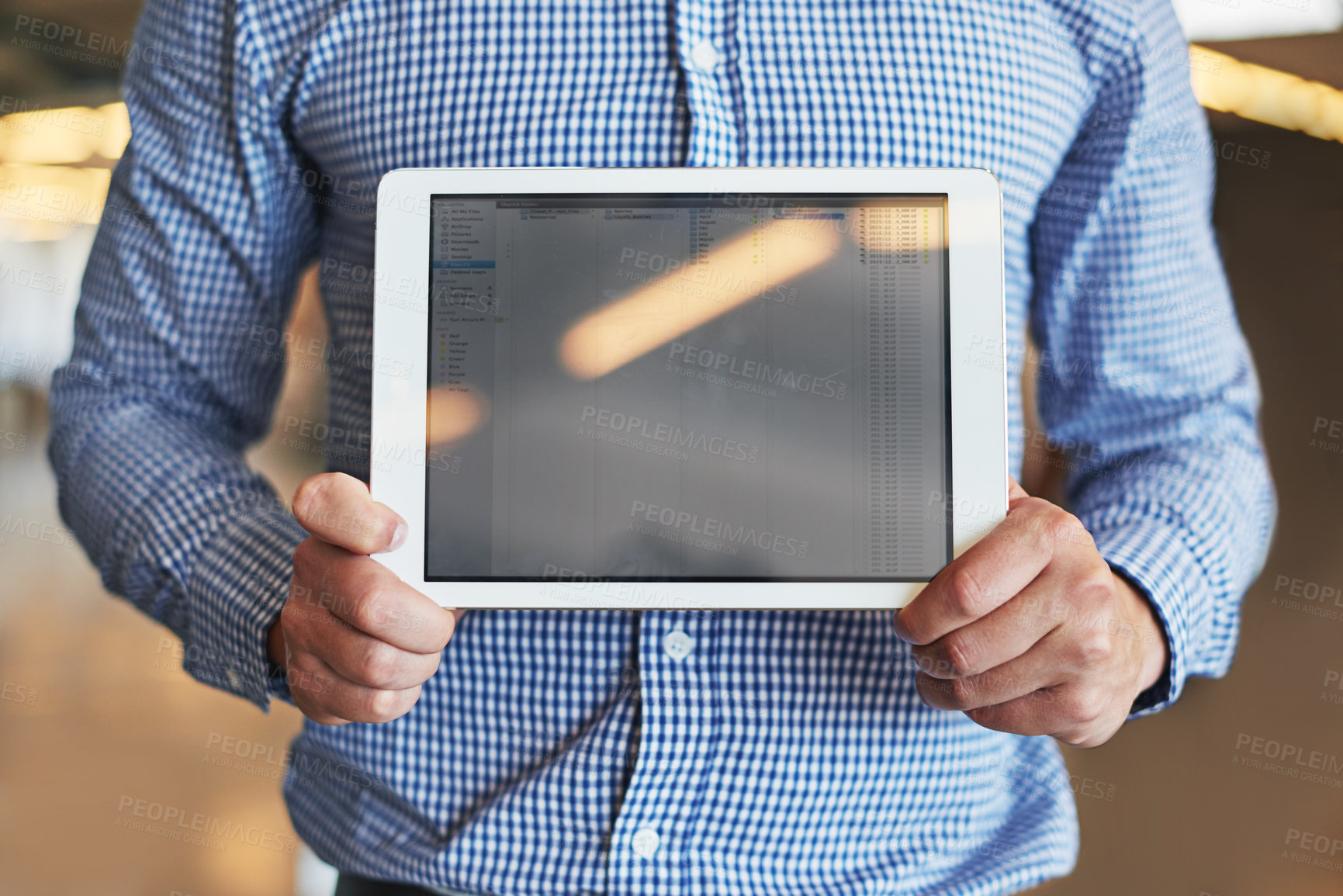 Buy stock photo Cropped shot of a businessman holding a digital tablet with a blank screen
