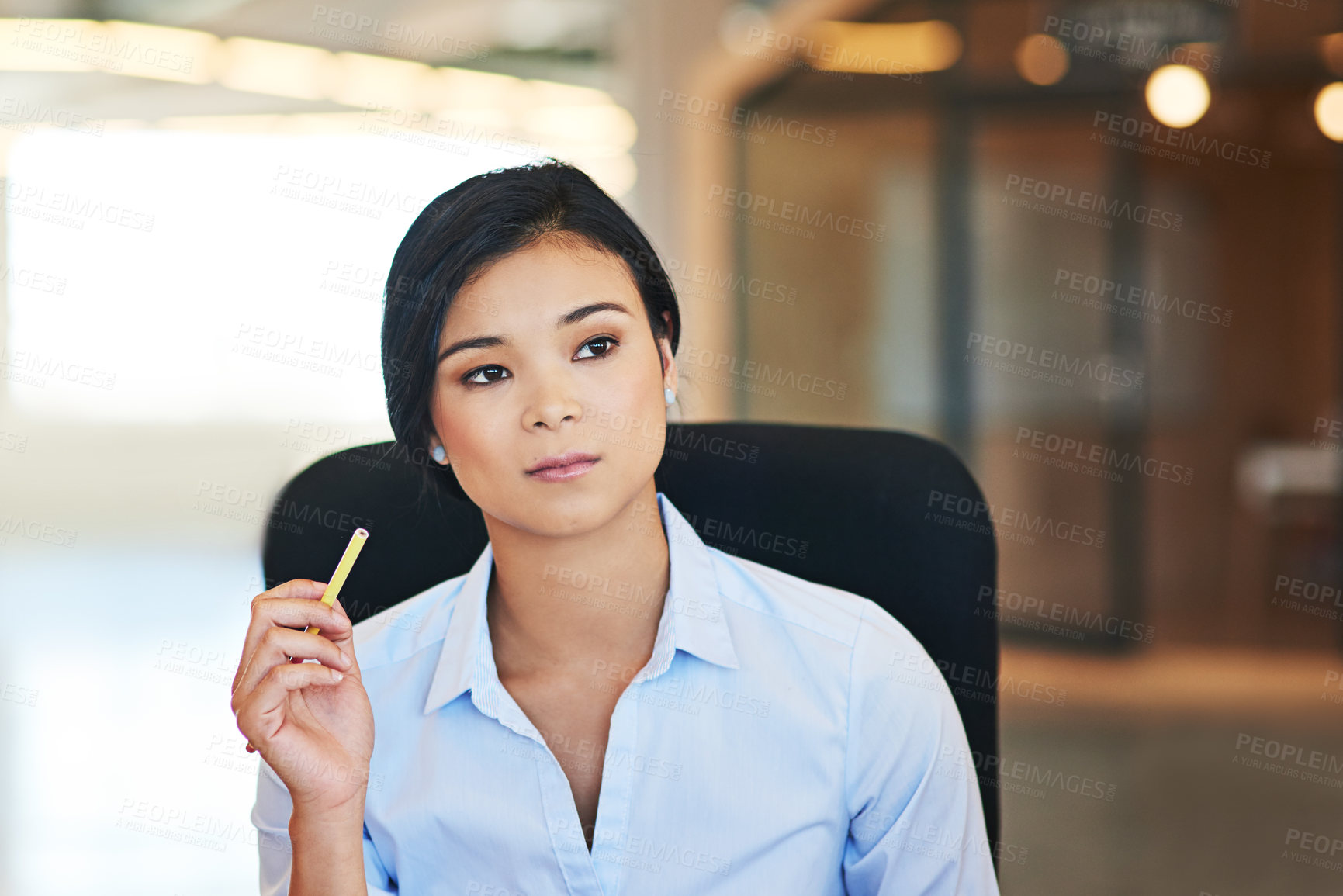 Buy stock photo Idea, planning and vision with a business asian woman in her office thinking about the future of her company. Mission, mindset and growth with a female employee holding a pencil while sitting at work