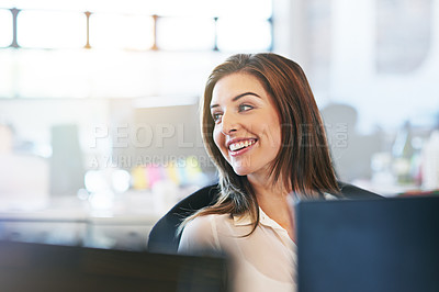 Buy stock photo Shot of a young businesswomen working in the office