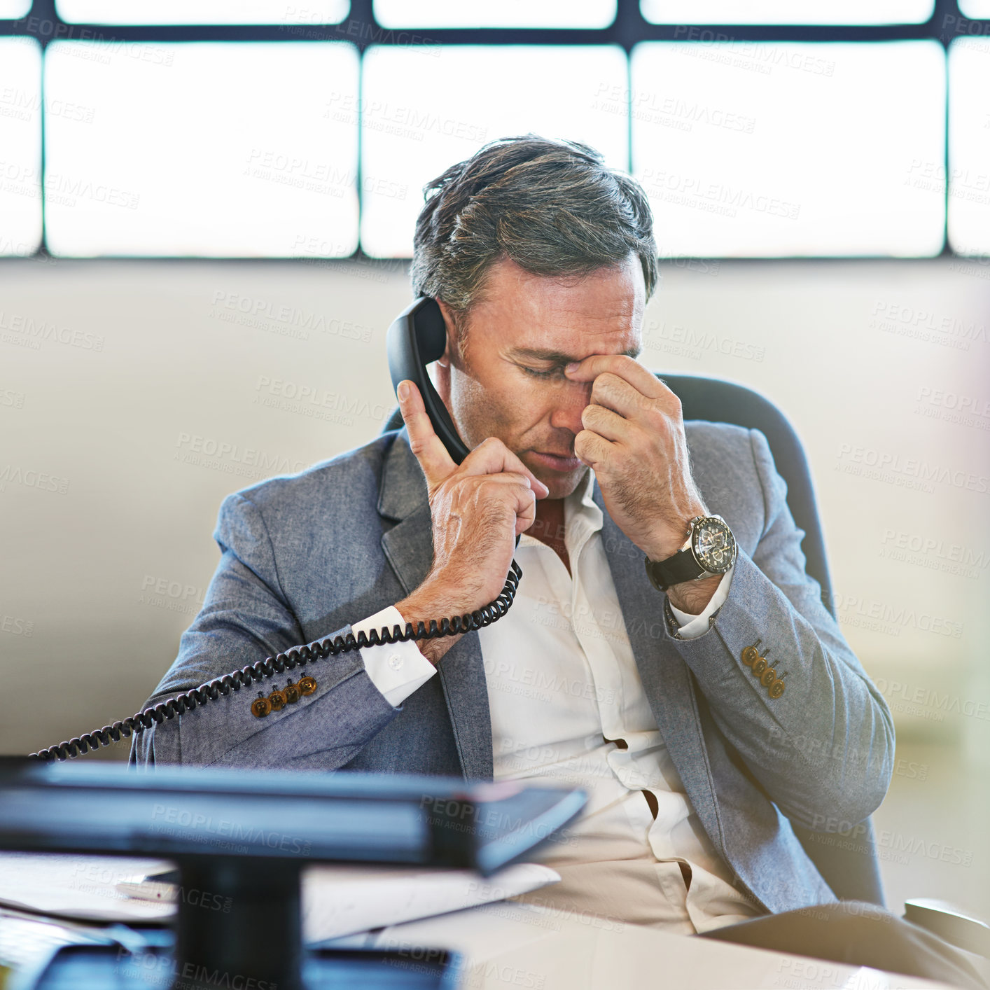 Buy stock photo Elderly businessman, headache and telephone call in office for online communicaton and tired employee. Frustrated man, head pain and deadline stress or employee anxiety for corporate phone call 
