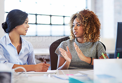 Buy stock photo Teamwork, meeting and planning with business women in the office, talking about company strategy. Collaboration, partnership and communication with a female employee chatting to a colleague at work