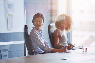 Buy stock photo Business people, women and office at desk for meeting, innovation or planning for marketing strategy. Black woman, focus and business meeting for goal in modern office, teamwork or company vision