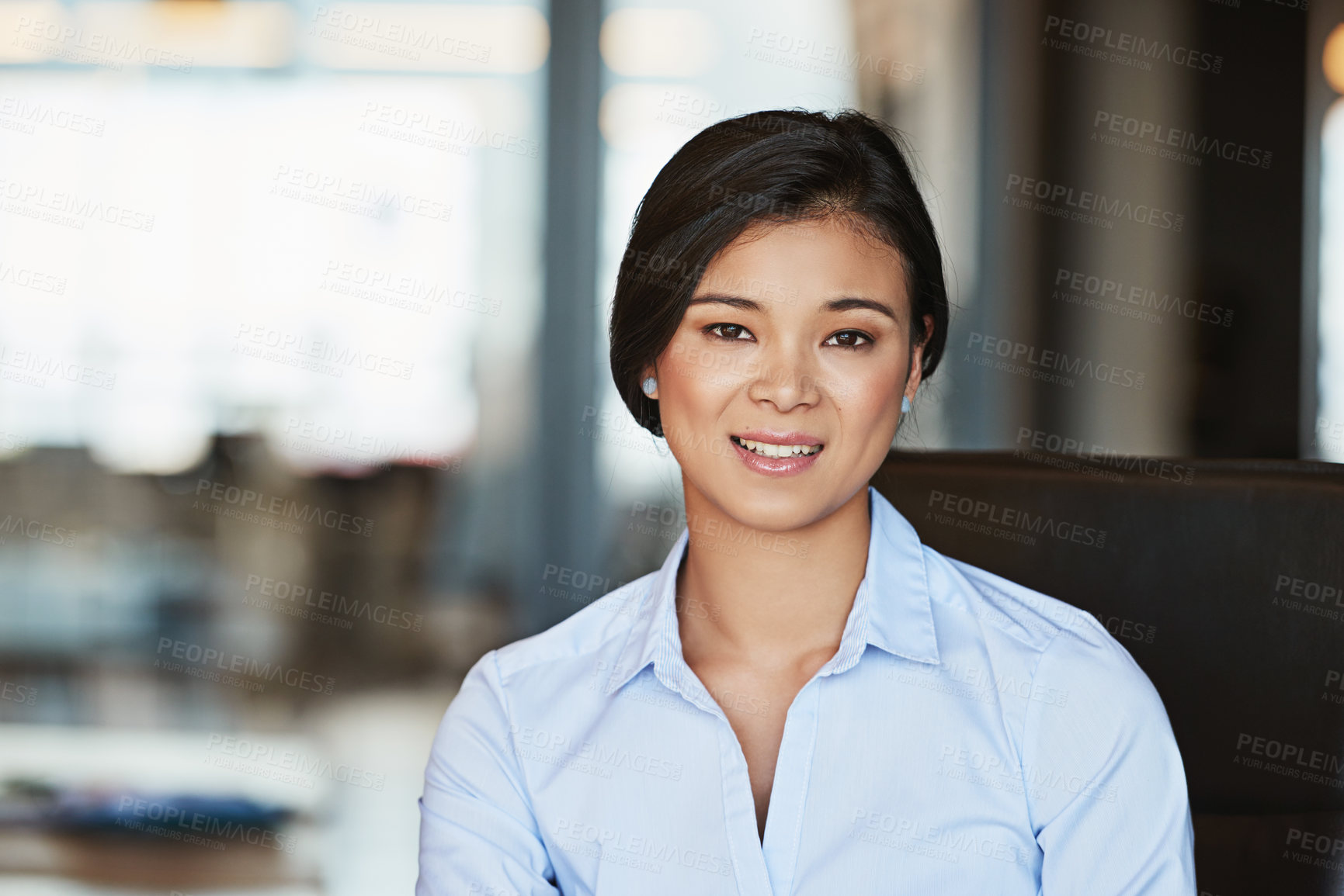 Buy stock photo Portrait of an ambitious young businesswoman working in the office