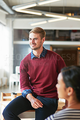Buy stock photo Man, business people and office with focus, learning and development of career for teamwork success. Modern office, woman and coworker sitting on table for marketing, team building or conversation