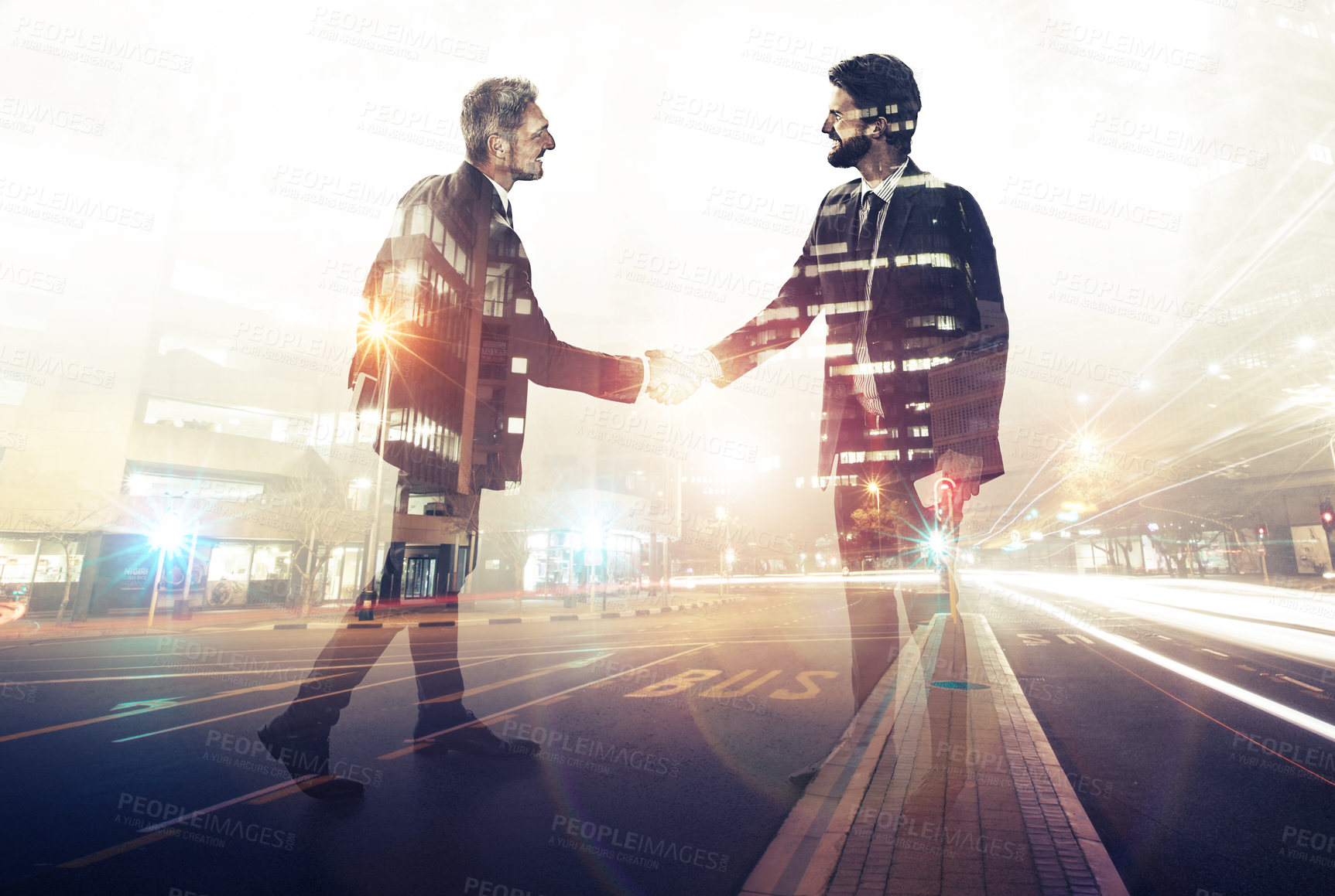 Buy stock photo Multiple exposure shot of a two businessmen shaking hands superimposed on an urban highway
