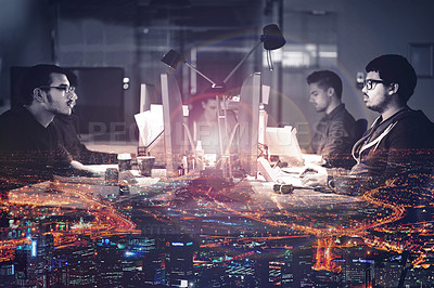 Buy stock photo Mutiple exposure shot of developers working late superimposed on a urban skyline at night