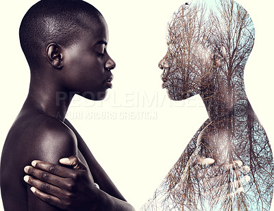 Buy stock photo Multiple exposure shot of a young woman standing face to face with a mirror image of herself