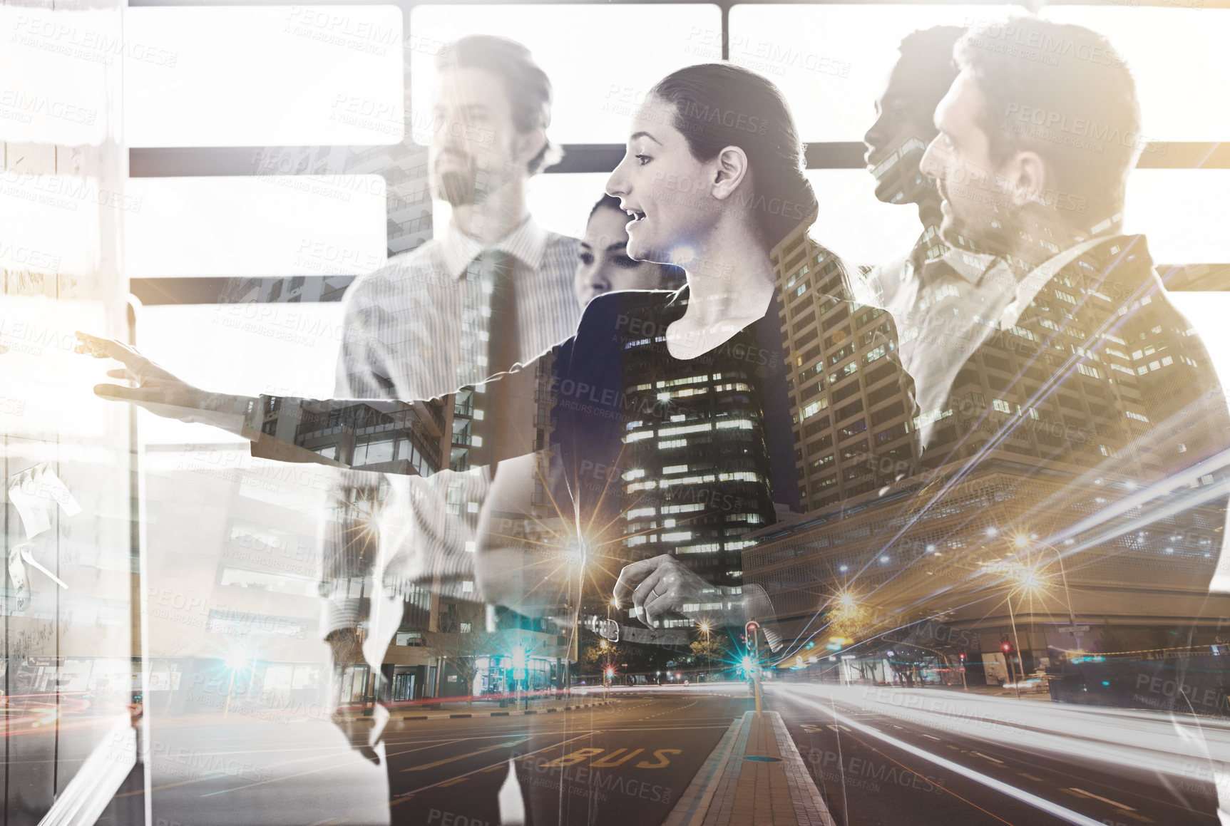 Buy stock photo Multiple exposure shot of a group of colleagues superimposed over a city background
