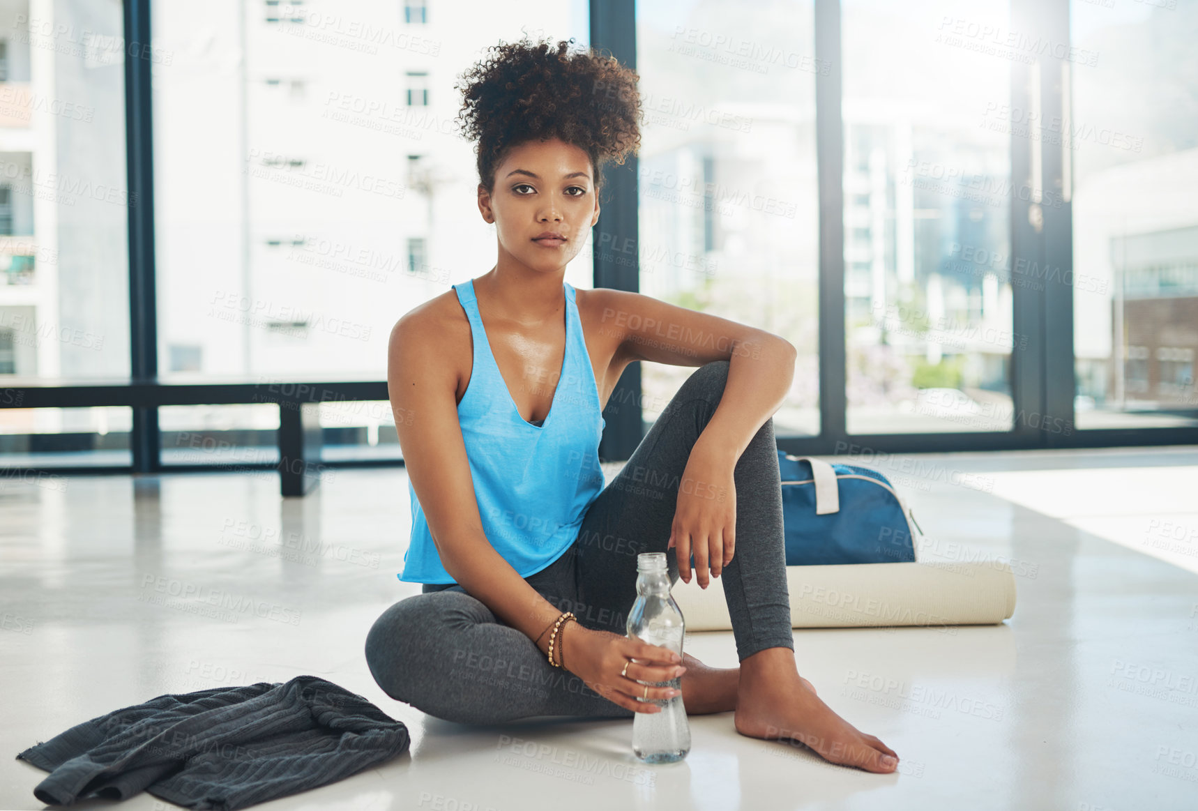 Buy stock photo Yoga, sweating or portrait of woman with water, fatigue or resilience for fitness, wellness or healthy routine. Relax, floor or tired girl resting in pilates, club or break with bottle for hydration