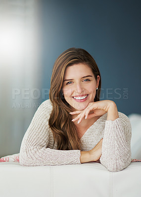 Buy stock photo Smile, portrait and woman relax on sofa in home living room on holiday. Face, happy and young female person from Canada on couch in lounge, apartment or house to enjoy mockup space and lens flare.