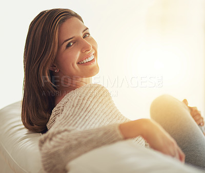 Buy stock photo Happy, portrait and woman relax on couch in home living room for easy lifestyle. Face, smile and young person from Canada on sofa in lounge, apartment or house to enjoy break, mockup and lens flare.