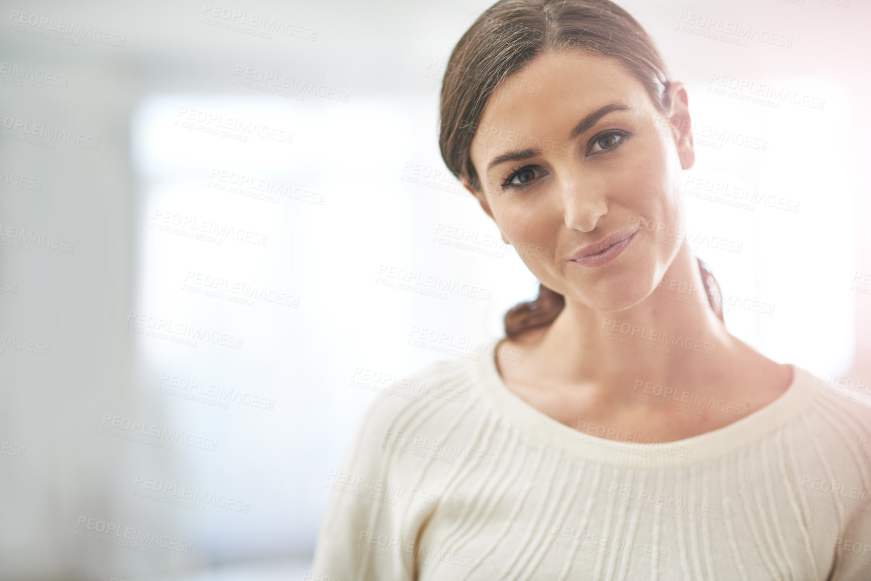 Buy stock photo Portrait of a young businesswoman standing in her office