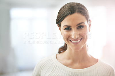 Buy stock photo Portrait of a young businesswoman standing in her office