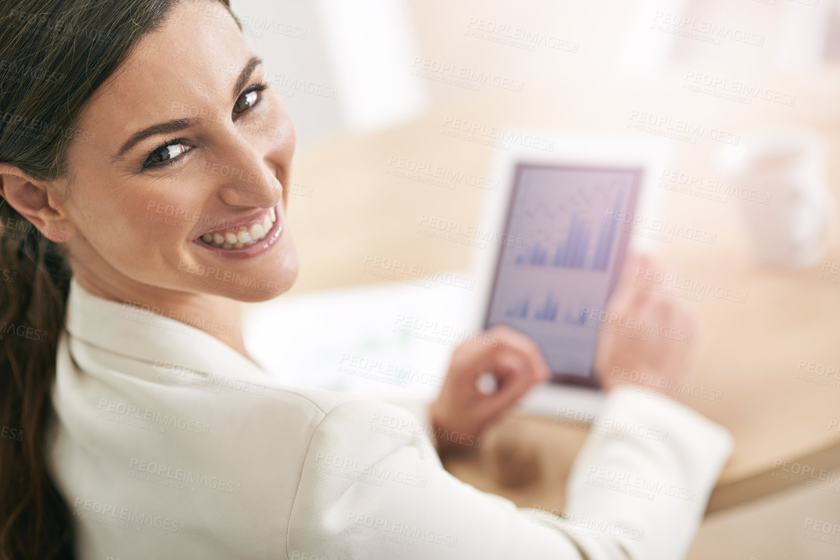 Buy stock photo Portrait of a young businesswoman using a digital tablet