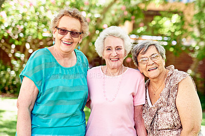 Buy stock photo Portrait of a group of smiling senior women standing outside
