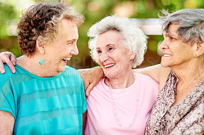 Buy stock photo Shot of a group of smiling senior women standing outside