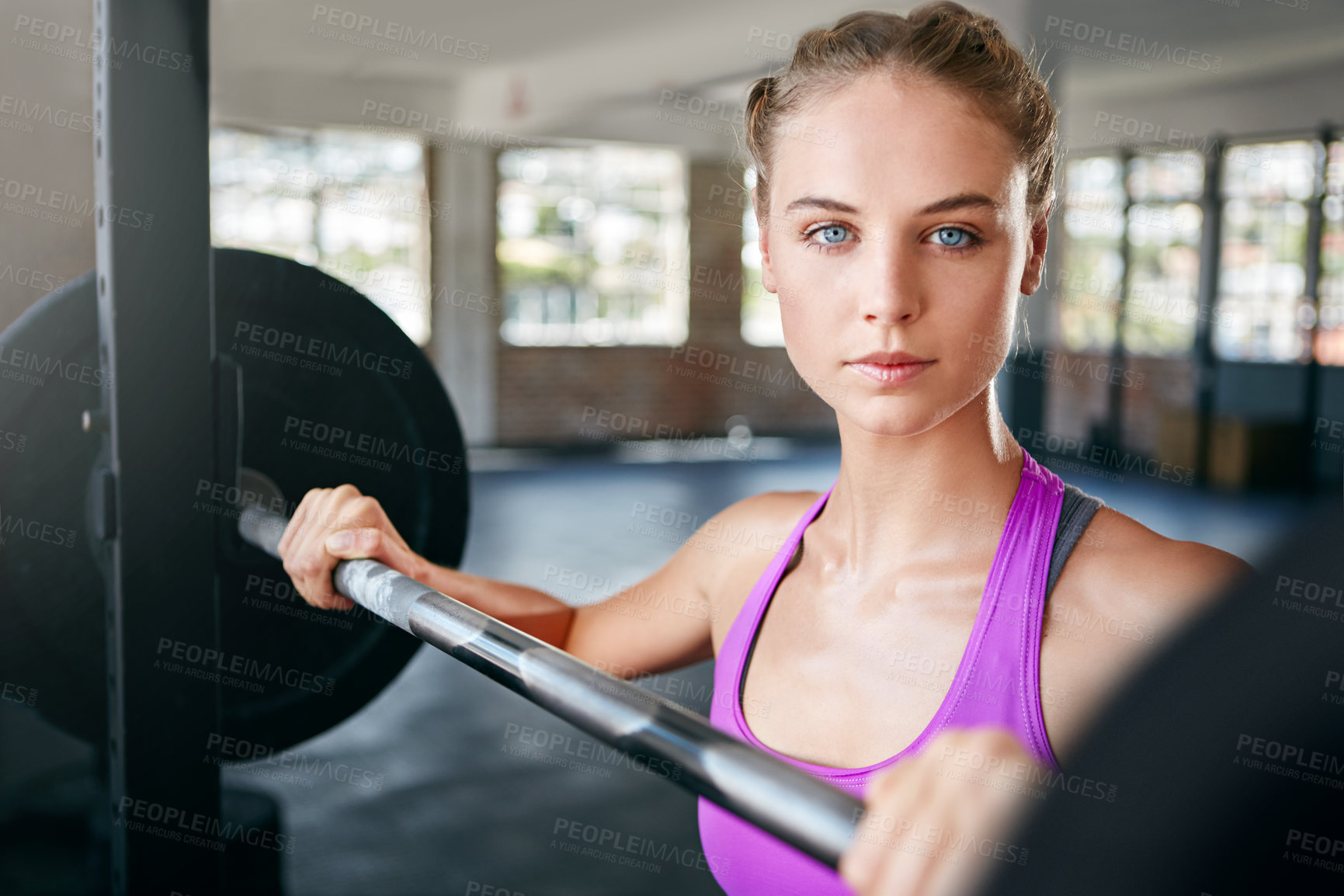 Buy stock photo Portrait, barbell and woman in gym, training and wellness with muscle strength, weightlifting and power. Challenge, strong or person in health club, endurance or intense workout with routine or pride