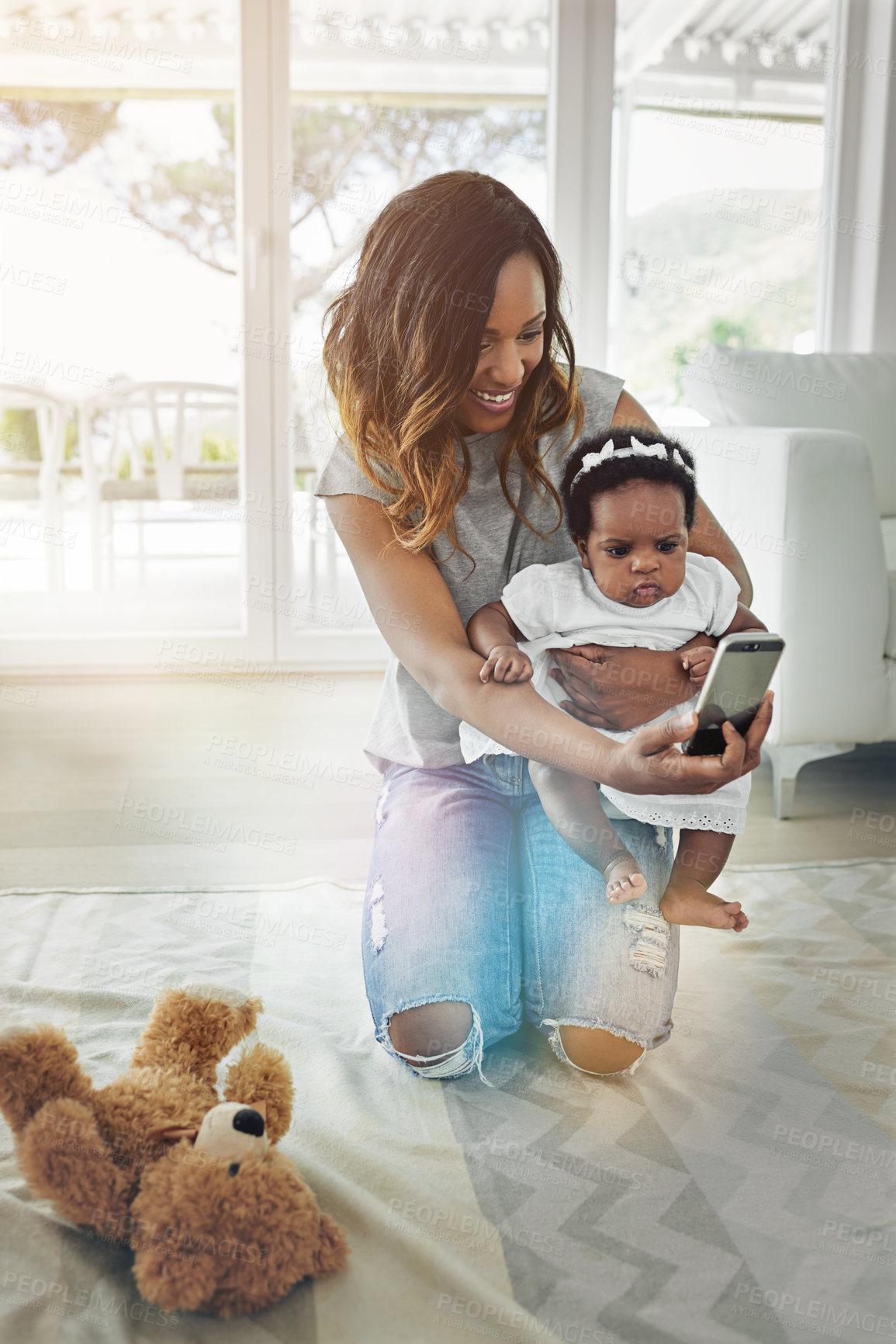 Buy stock photo Mother, baby and selfie in house for happiness, social media and bonding together with smile. Black woman, child and family memory in home for internet post, love and profile picture with teddy bear