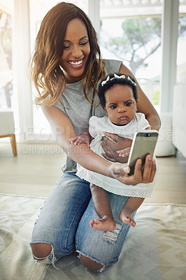 Buy stock photo Baby, mother and selfie in house for happiness, social media and bonding together with smile. Black woman, child and family memory in home for internet post, love and profile picture with relax time