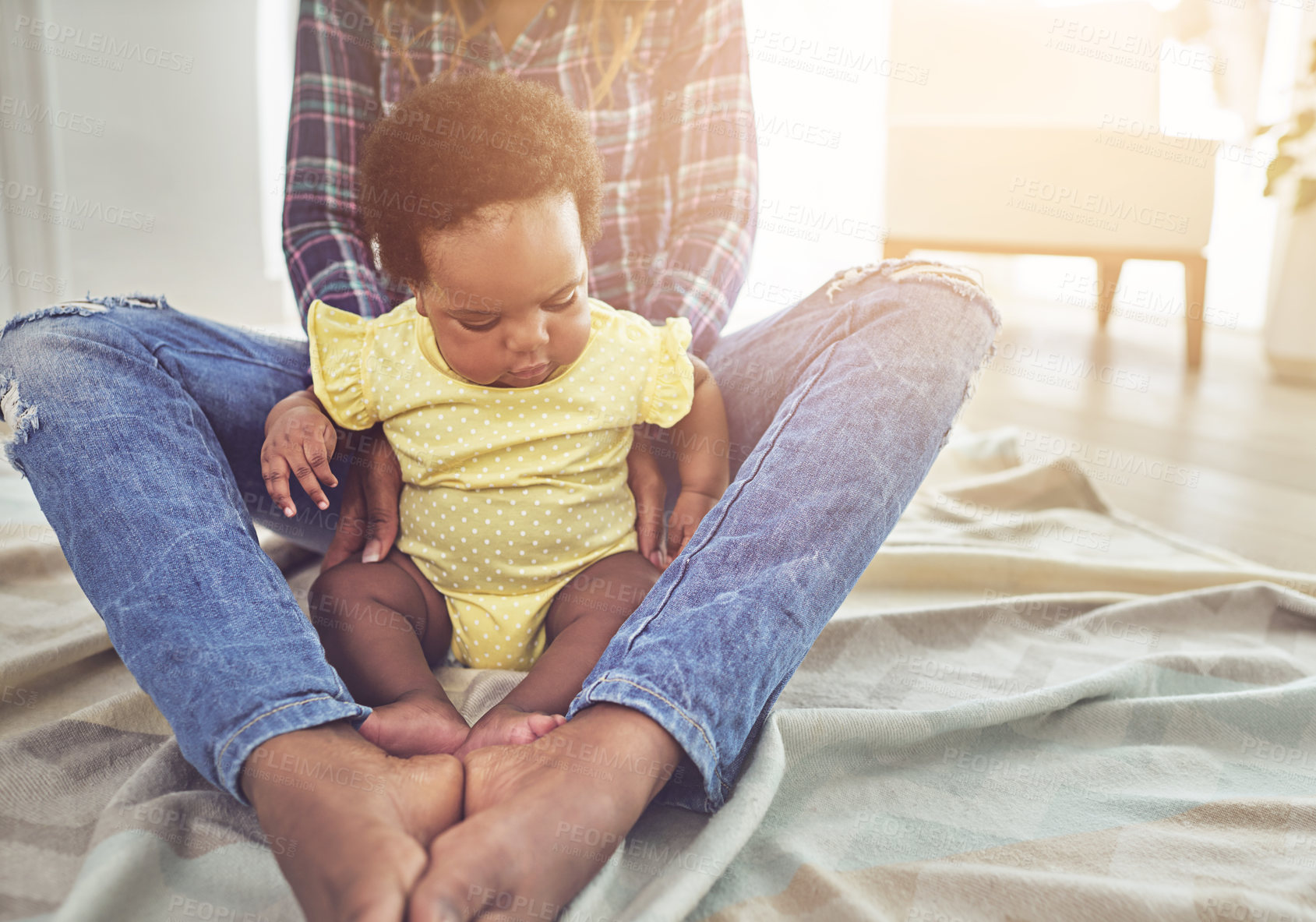 Buy stock photo Cropped shot of a mother and her little baby girl at home