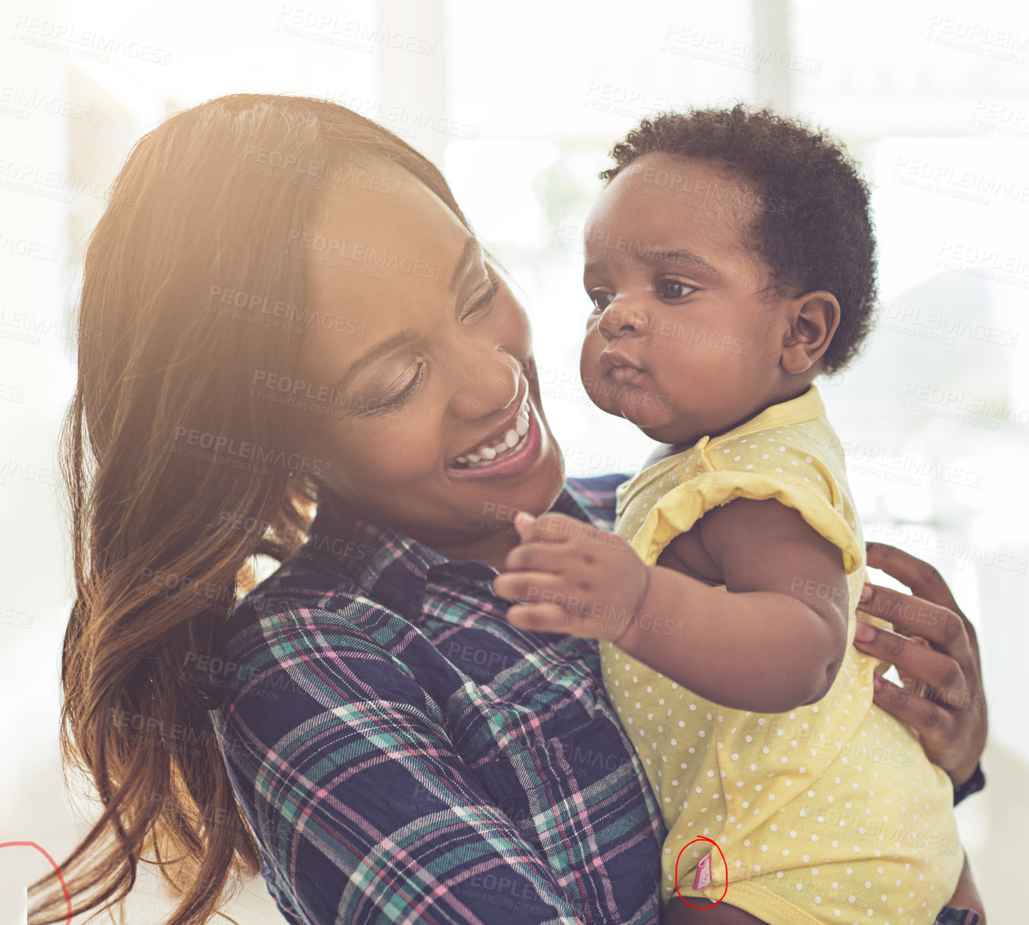 Buy stock photo Cropped shot of a young mother and her little baby girl at home