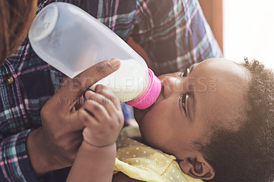 Buy stock photo Feeding, mom and love for baby, bottle and nutrition for child with milk, vitamin D and calcium for girl. Black family, wellness and protein for growth, development and infant with woman in house