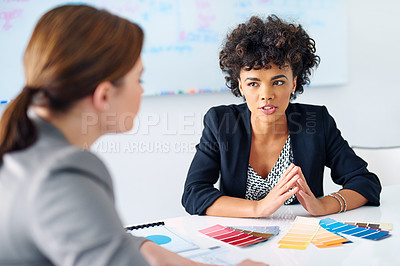 Buy stock photo Cropped shot of two designers looking at color swatches