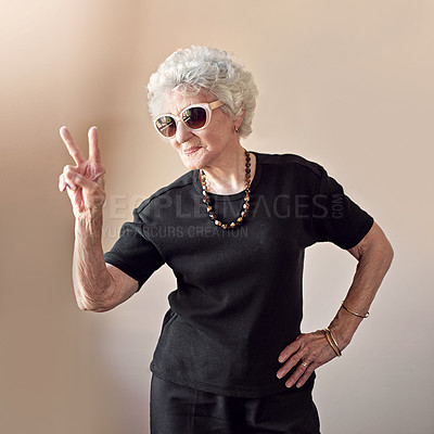 Buy stock photo Shot of a cool senior woman at home