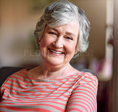 Buy stock photo Shot of a senior woman relaxing at home