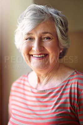 Buy stock photo Shot of a senior woman relaxing at home