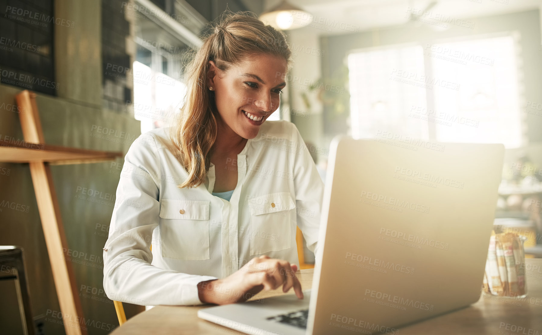 Buy stock photo Woman, laptop and coffee shop for online news, freelancer and website for article research. Female person, restaurant and reporter to review bistro service or hospitality, typing column and media