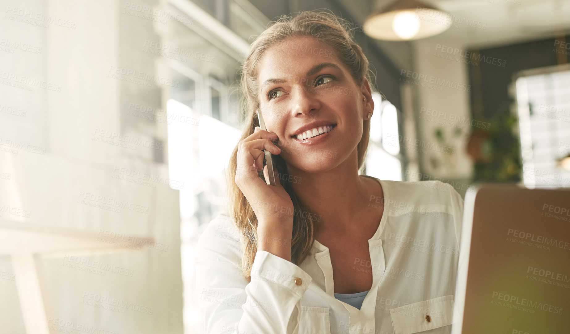 Buy stock photo Shot of an attractive young woman in a coffee shop