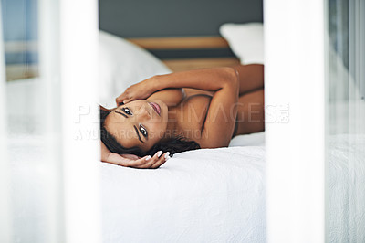 Buy stock photo Portrait of a gorgeous young woman posing seductively in her bedroom