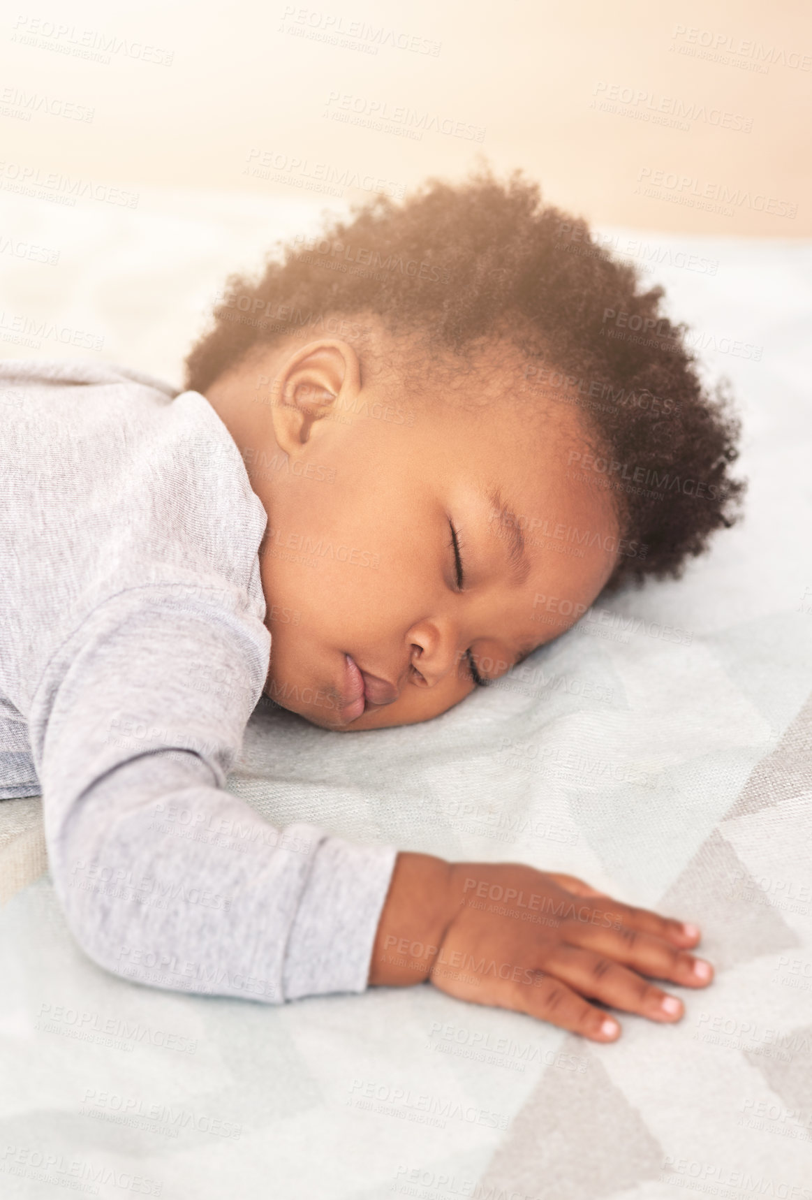 Buy stock photo Comfort, bed and baby sleeping in home on blanket for rest, nap time and dreaming in nursery. Childcare, newborn and cute, tired and African child in bedroom sleep for comfortable, relaxing and calm