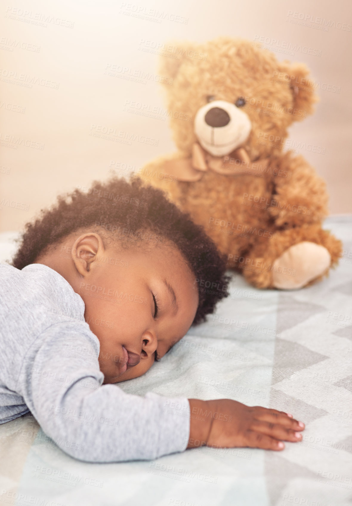 Buy stock photo Sleeping, teddy bear and dreaming with baby in bedroom for carefree, development and innocence. Cute, relax and comfortable with african infant and toy resting at home for morning, nap and bedtime