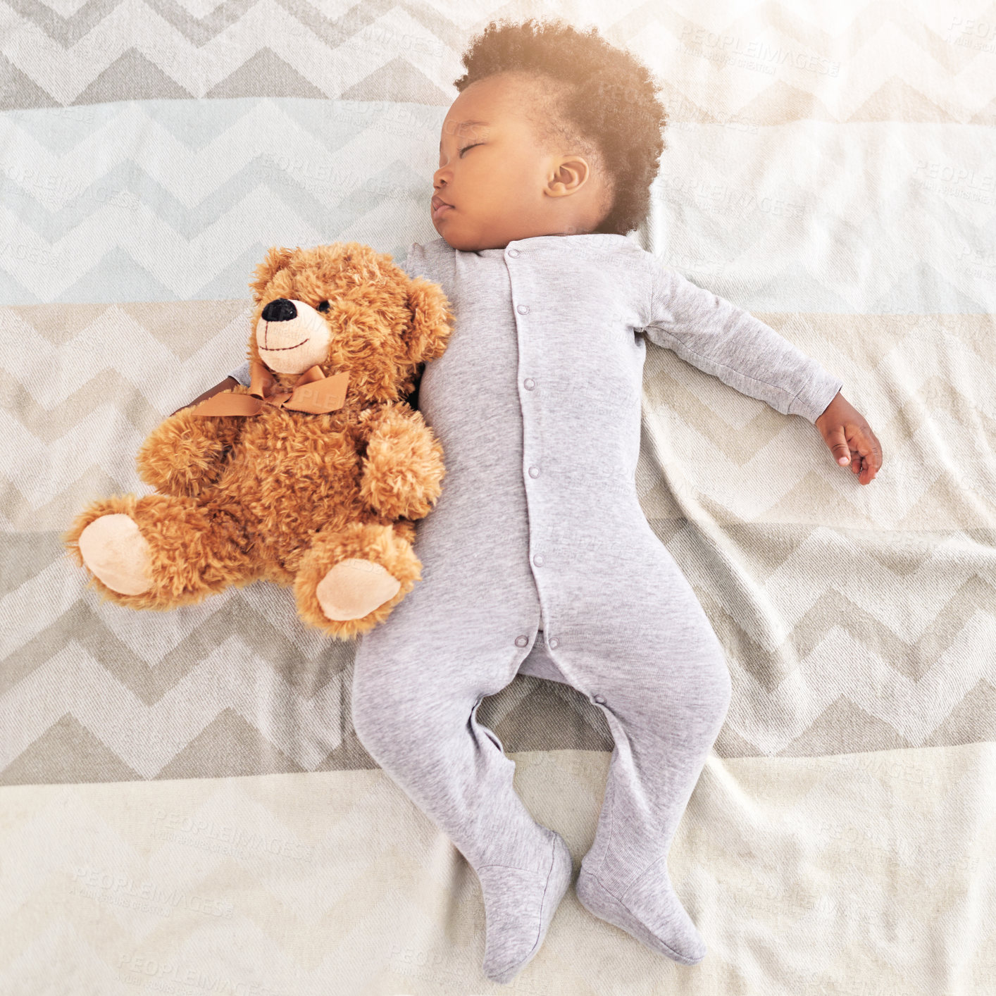 Buy stock photo Top view, teddy bear and baby sleeping in bed for rest, nap time and dreaming in nursery. Childcare, newborn and cute, tired and African child with toy in bedroom sleep for comfort, relax and calm