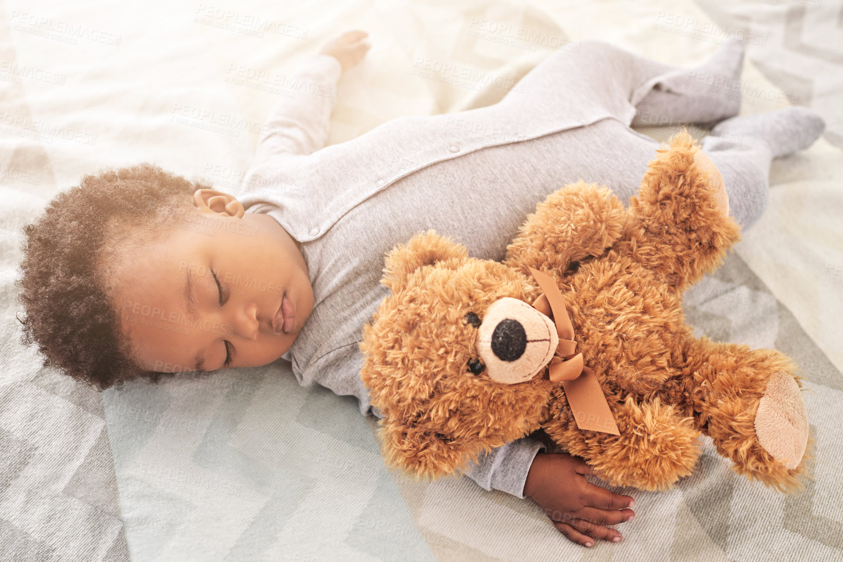 Buy stock photo Sleeping, teddy bear and toy with baby in bedroom for carefree, development and innocence. Dreaming, relax and comfortable with african infant in nursery at home for morning, resting and bedtime