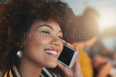 Buy stock photo Cropped shot of a young woman using her cellphone working late in the office
