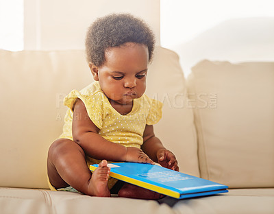 Buy stock photo Full length shot of a baby girl sitting on the sofa at home