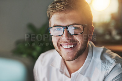 Buy stock photo Cropped shot of a young designer working late at the office