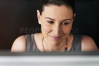 Buy stock photo Cropped shot of a businesswoman working on her pc in the office