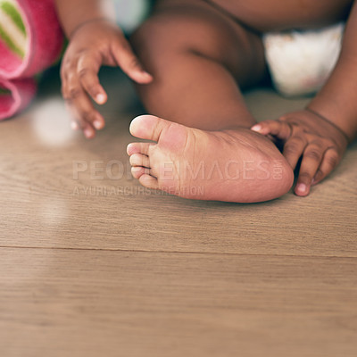 Buy stock photo Closeup of baby, kids and feet with toes on wooden floor, home or nursery room mockup. Young infant children, foot and healthy development of growth, lifestyle or care of cute, small and growing body