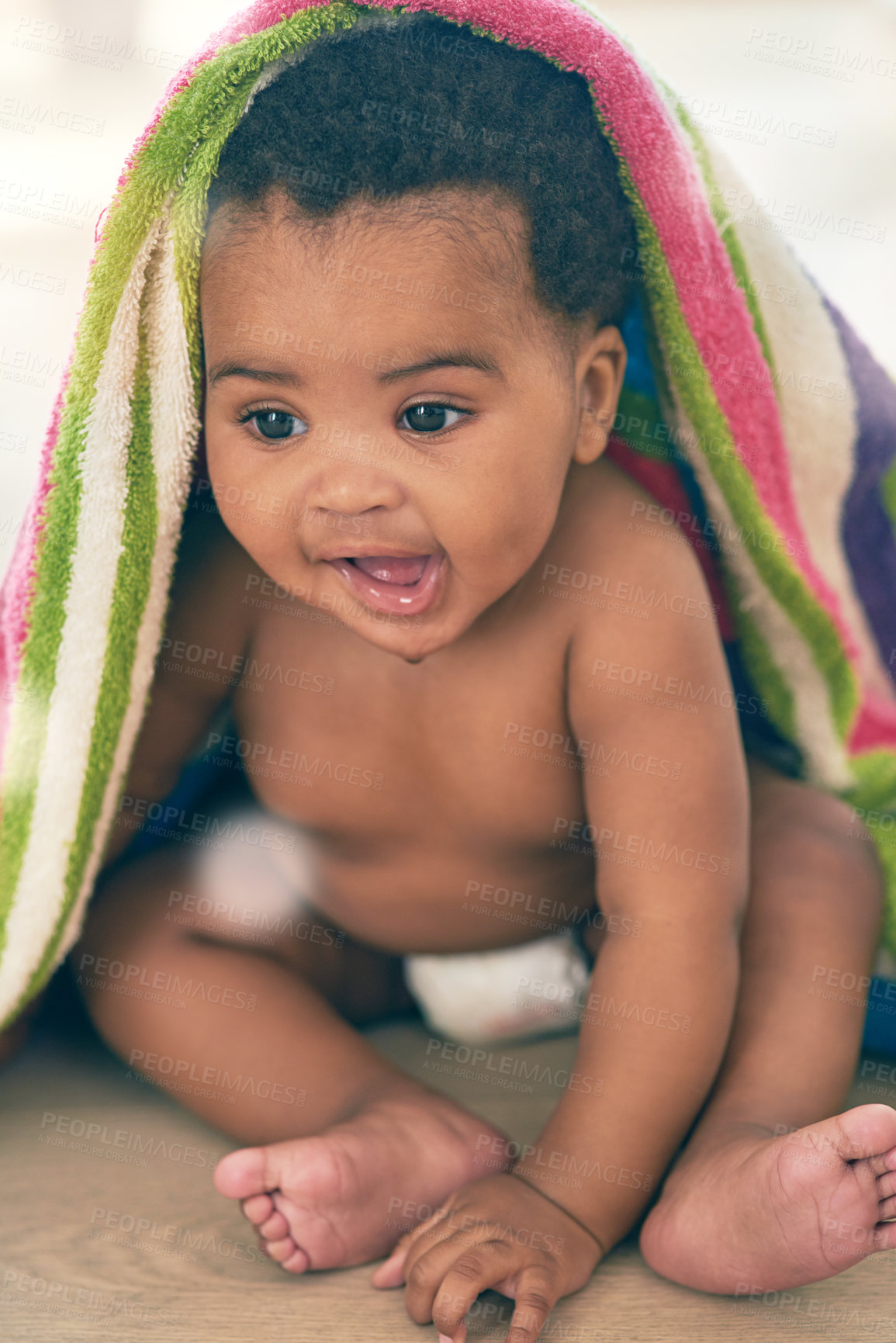 Buy stock photo Cute baby, black child and blanket for play, game and peekaboo on nursery room floor, happiness and fun. Happy young infant kid, girl and smile for healthy development, growth and lifestyle in house 